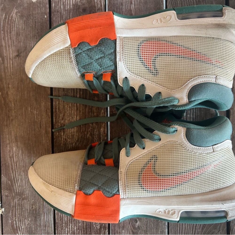 Nike LeBron Sneakers with Green and Orange Accents